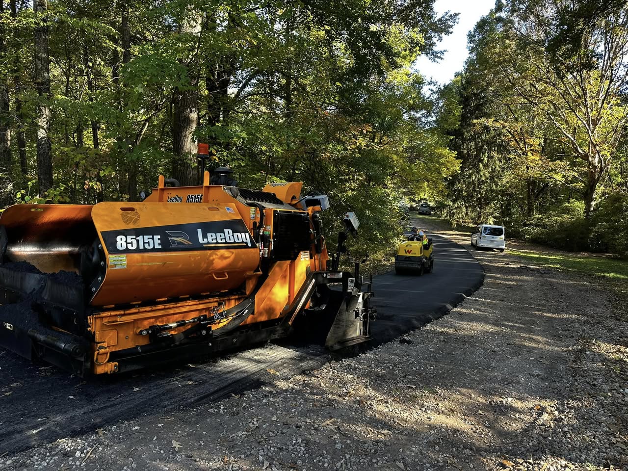 Turning a Wooded Driveway into a Smooth Asphalt Road — A Charlotte Project Story